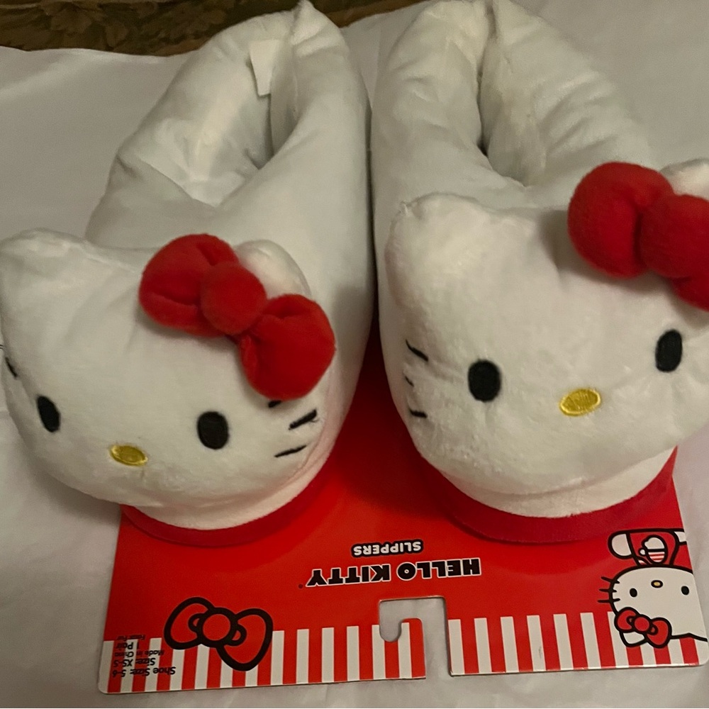 NWT, Limited Edition “Hello Kitty” Slippers, Size 5-6 
(Sizes included in pics)